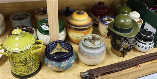 A novelty dog tobacco jar and 20 other tobacco jars, various (21)